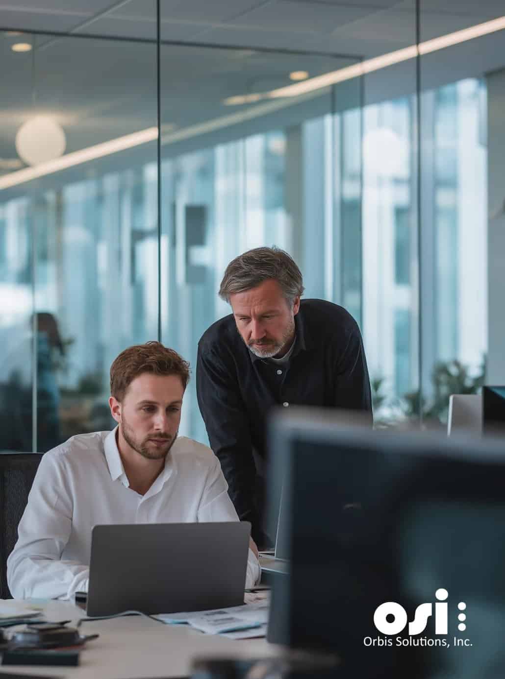 Team discussing strategies for Network Security in a compliance assurance meeting, highlighting ongoing risk management.